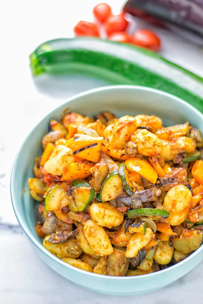 This Sheet Pan Ratatouille Gnocchi are super easy to make and naturally vegan, gluten free. It’s made on a sheet pan which is a breeze for dinner, lunch, meal prep and work lunches. Try it now and the whole family will love it. #vegan #dairyfree #glutenfree #vegetarian #gnocchi #ratatouille #sheetpanmeals #contentednesscooking #dinner #lunch #mealprep #worklunchideas #familyfood #newyearhealtyeating 