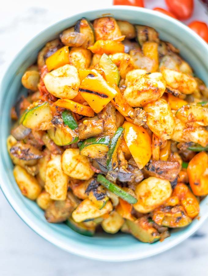 This Sheet Pan Ratatouille Gnocchi are super easy to make and naturally vegan, gluten free. It’s made on a sheet pan which is a breeze for dinner, lunch, meal prep and work lunches. Try it now and the whole family will love it. #vegan #dairyfree #glutenfree #vegetarian #gnocchi #ratatouille #sheetpanmeals #contentednesscooking #dinner #lunch #mealprep #worklunchideas #familyfood #newyearhealtyeating