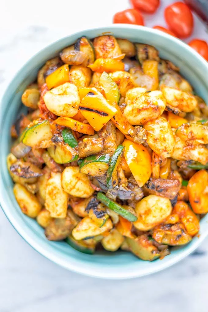 This Sheet Pan Ratatouille Gnocchi are super easy to make and naturally vegan, gluten free. It’s made on a sheet pan which is a breeze for dinner, lunch, meal prep and work lunches. Try it now and the whole family will love it. #vegan #dairyfree #glutenfree #vegetarian #gnocchi #ratatouille #sheetpanmeals #contentednesscooking #dinner #lunch #mealprep #worklunchideas #familyfood #newyearhealtyeating 