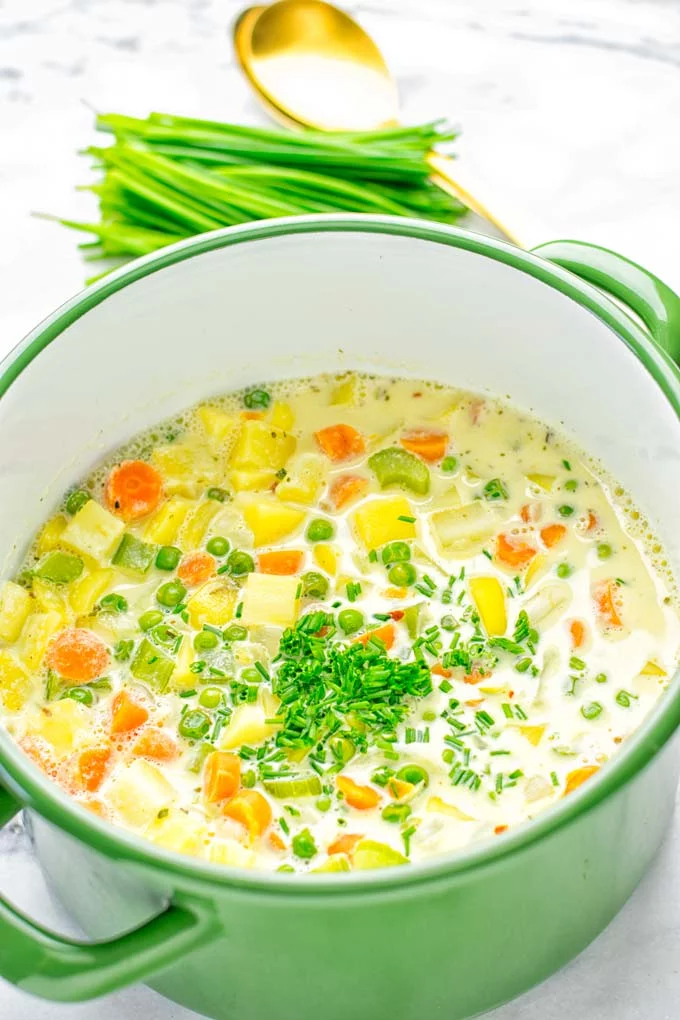 You won’t believe this Vegan Pot Pie Soup is ready in 15 minutes. No one would guess it’s vegan, gluten free, and dairy free. It’s a satisfying meal made in one pot for lunch, dinner, meal prep even work lunches that you and your family will love. A time saving meal that is also a keeper for the holidays and Christmas. #vegan #glutenfree #dairyfree #vegetarian #onepotmeals #christmasfood #contentednesscooking #mealprep #dinner #lunch #worklunchideas #15minutemeals #holidaychristmas