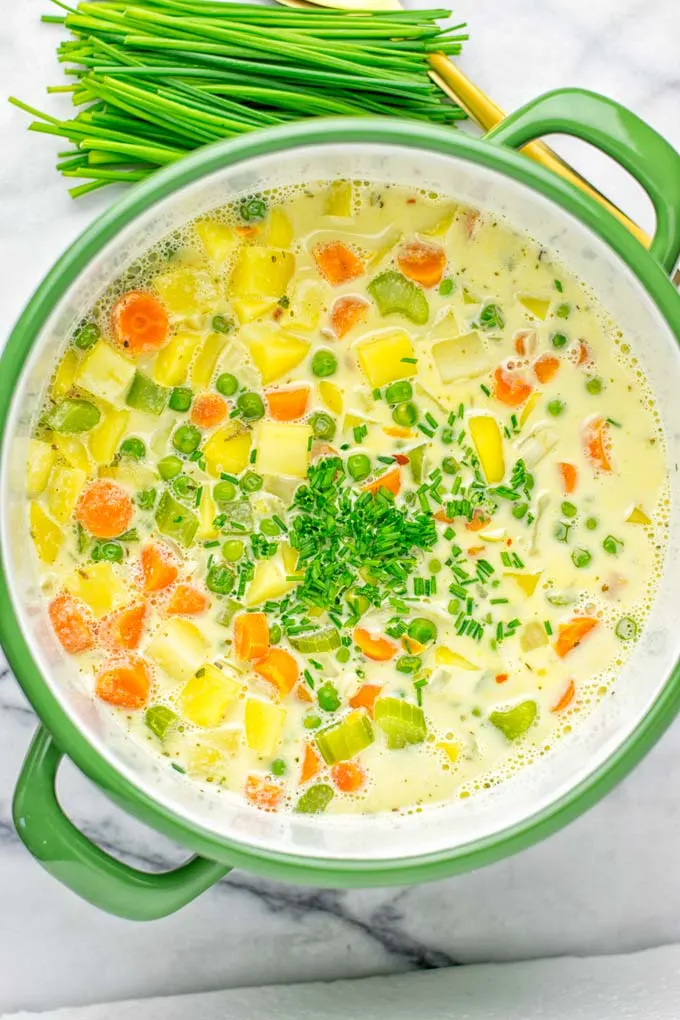 You won’t believe this Vegan Pot Pie Soup is ready in 15 minutes. No one would guess it’s vegan, gluten free, and dairy free. It’s a satisfying meal made in one pot for lunch, dinner, meal prep even work lunches that you and your family will love. A time saving meal that is also a keeper for the holidays and Christmas. #vegan #glutenfree #dairyfree #vegetarian #onepotmeals #christmasfood #contentednesscooking #mealprep #dinner #lunch #worklunchideas #15minutemeals #holidaychristmas