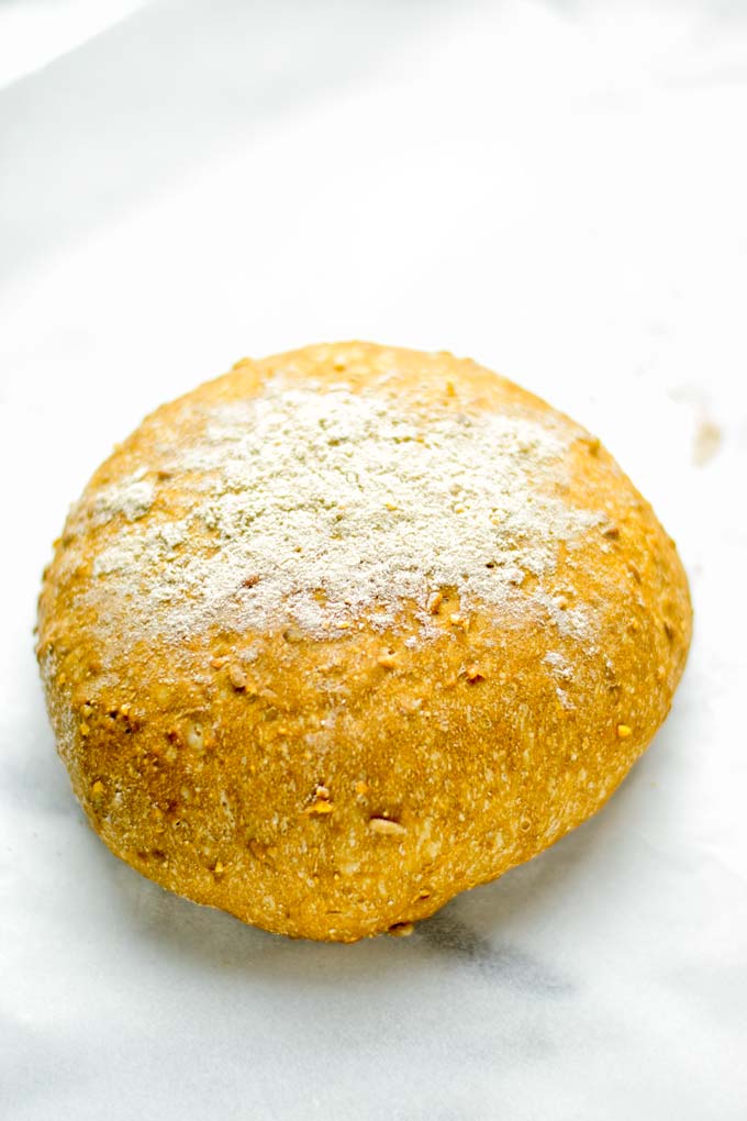 This Artisan Bread is naturally vegan, gluten free and made in the Dutch oven. It’s easy to prepare in one bowl and the result will be impressive. Trust me there is nothing better than fresh homemade bread from the oven. This is perfect for breakfast, lunch and even dinner. Try this for your family and everyone will love it. #vegan #dairyfree #glutenfree #contentednesscooking #breakfast #dinner #lunch #artisanbread #nokneadbread #dutchovenbread #homemadebread #kidfriendlymeals #budgetmeals 