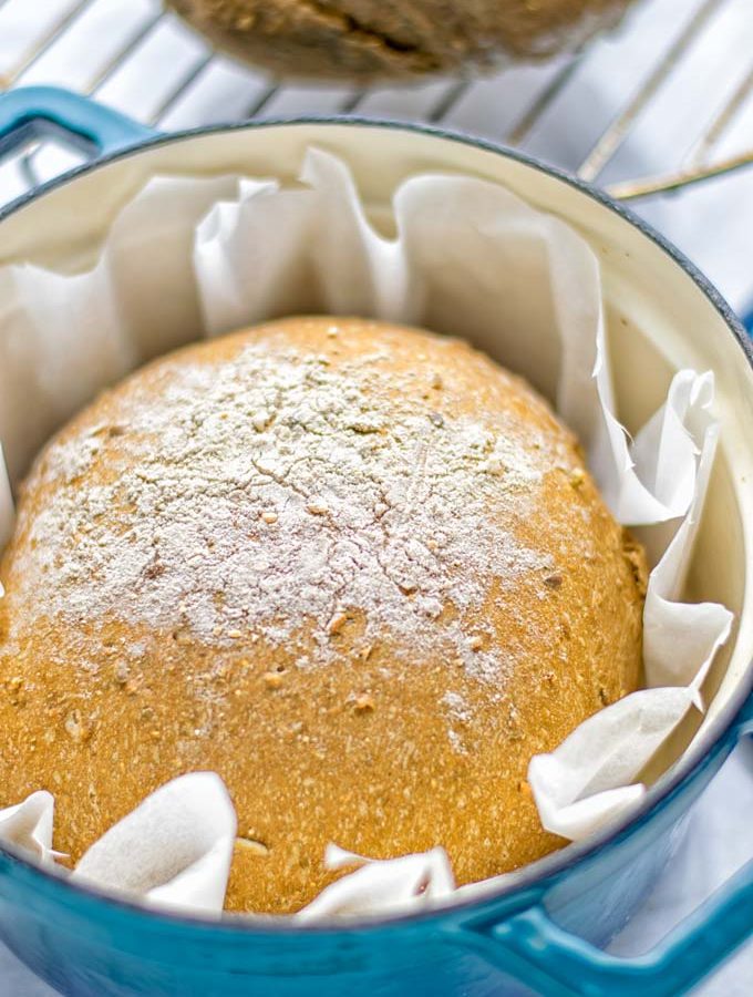 This Artisan Bread is naturally vegan, gluten free and made in the Dutch oven. It’s super easy to prepare in one bowl and the result will be impressive. Trust me there is nothing better than fresh homemade bread from the oven. This keeper is perfect for breakfast, lunch and even dinner. Try this for your family and everyone will love it. #vegan #dairyfree #glutenfree #contentednesscooking #breakfast #dinner #lunch #artisanbread #nokneadbread #dutchovenbread #homemadebread #kidfriendlymeals #budgetmeals