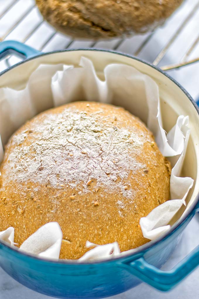 This Artisan Bread is naturally vegan, gluten free and made in the Dutch oven. It’s easy to prepare in one bowl and the result will be impressive. Trust me there is nothing better than fresh homemade bread from the oven. This is perfect for breakfast, lunch and even dinner. Try this for your family and everyone will love it. #vegan #dairyfree #glutenfree #contentednesscooking #breakfast #dinner #lunch #artisanbread #nokneadbread #dutchovenbread #homemadebread #kidfriendlymeals #budgetmeals 