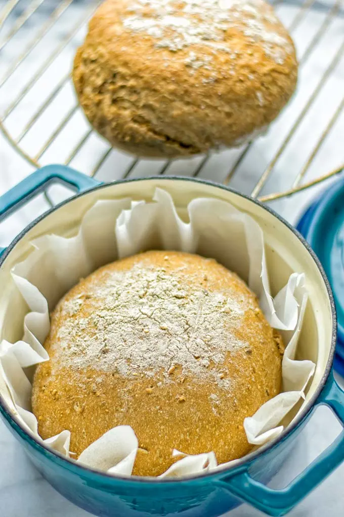 This Artisan Bread is naturally vegan, gluten free and made in the Dutch oven. It’s easy to prepare in one bowl and the result will be impressive. Trust me there is nothing better than fresh homemade bread from the oven. This is perfect for breakfast, lunch and even dinner. Try this for your family and everyone will love it. #vegan #dairyfree #glutenfree #contentednesscooking #breakfast #dinner #lunch #artisanbread #nokneadbread #dutchovenbread #homemadebread #kidfriendlymeals #budgetmeals 