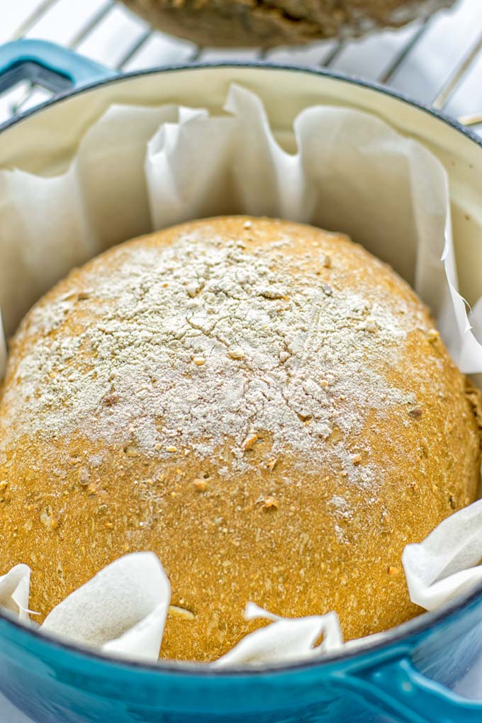 This Artisan Bread is naturally vegan, gluten free and made in the Dutch oven. It’s easy to prepare in one bowl and the result will be impressive. Trust me there is nothing better than fresh homemade bread from the oven. This is perfect for breakfast, lunch and even dinner. Try this for your family and everyone will love it. #vegan #dairyfree #glutenfree #contentednesscooking #breakfast #dinner #lunch #artisanbread #nokneadbread #dutchovenbread #homemadebread #kidfriendlymeals #budgetmeals 