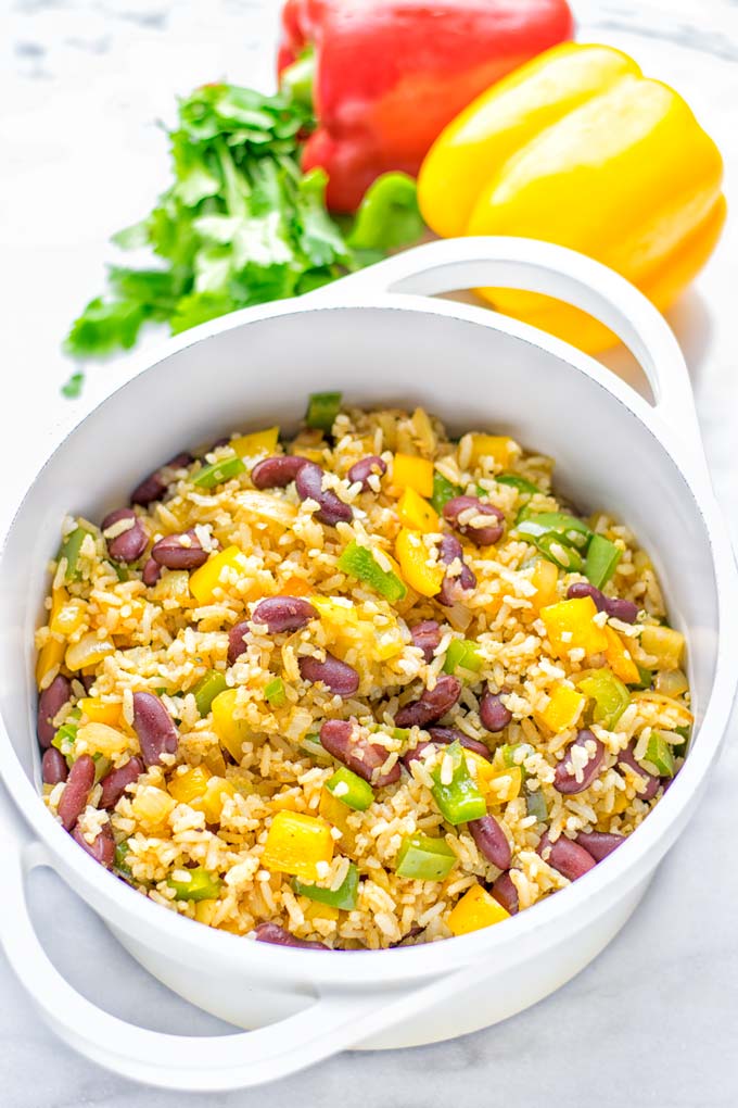 This Cajun Red Beans and Rice is an amazing one pot meal which is naturally vegan, gluten free. It’s packed with bold and fantastic flavors the whole family will love for dinner, lunch, meal prep and work lunch and so much more. Once you’ve tried this you can’t stop eating it so easy to make! #vegan #dairyfree #glutenfree #vegetarian #onepotmeals #dinner #lunch #worklunchideas #budgetmeals #contentednesscooking #cajunbeansandrice #mealprep 