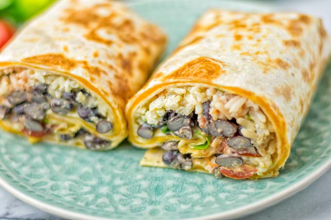 This Rice and Beans Quesarito is entirelly vegan, gluten free and so easy to make. It’s cheesy, incredibly satisfying and so delicious for dinner, lunch, meal prep (reheat beautifully) and amazing for work lunches. An amazing dairy free alternative for everyone that the whole family will love. #vegan #glutenfree #dairyfree #vegetarian #contentednesscooking #quesarito #riceandbeans #dinner #lunch #worklunchideas #mealprep #quesadila #burrito 