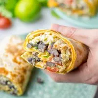 This Rice and Beans Quesarito is entirelly vegan, gluten free and so easy to make. It’s cheesy, incredibly satisfying and so delicious for dinner, lunch, meal prep (reheat beautifully) and amazing for work lunches. An amazing dairy free alternative for everyone that the whole family will love. #vegan #glutenfree #dairyfree #vegetarian #contentednesscooking #quesarito #riceandbeans #dinner #lunch #worklunchideas #mealprep #quesadila #burrito