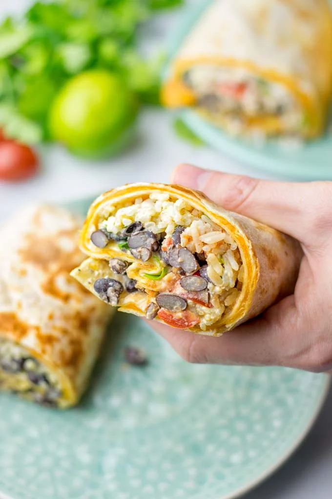 This Rice and Beans Quesarito is entirelly vegan, gluten free and so easy to make. It’s cheesy, incredibly satisfying and so delicious for dinner, lunch, meal prep (reheat beautifully) and amazing for work lunches. An amazing dairy free alternative for everyone that the whole family will love. #vegan #glutenfree #dairyfree #vegetarian #contentednesscooking #quesarito #riceandbeans #dinner #lunch #worklunchideas #mealprep #quesadila #burrito 