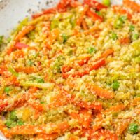 Cauliflower Fried Rice as it is being made in a pan.