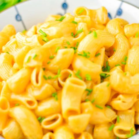 Closeup of Instant Pot Mac and Cheese sprinkled with chives.