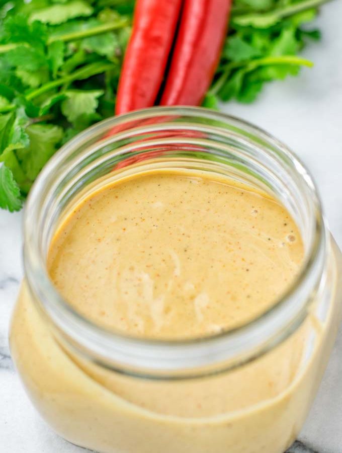 Closeup of Satay Sauce in a jar.