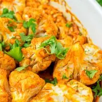 BUffalo Cauliflower decorated with cilantro.