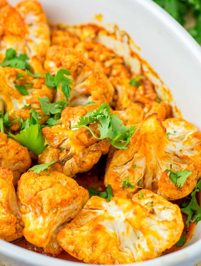BUffalo Cauliflower decorated with cilantro.