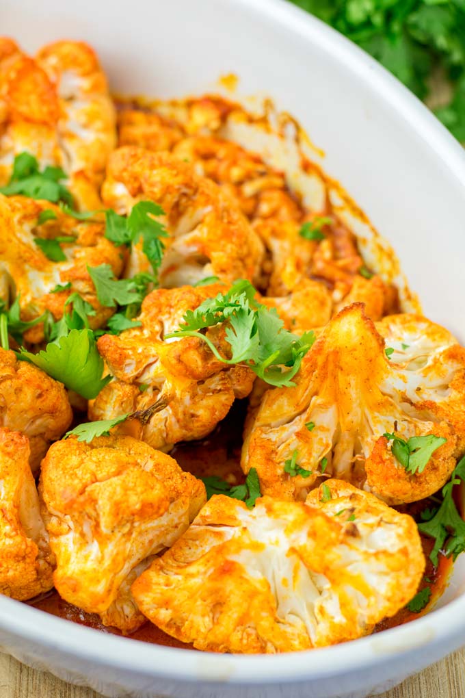 BUffalo Cauliflower decorated with cilantro.