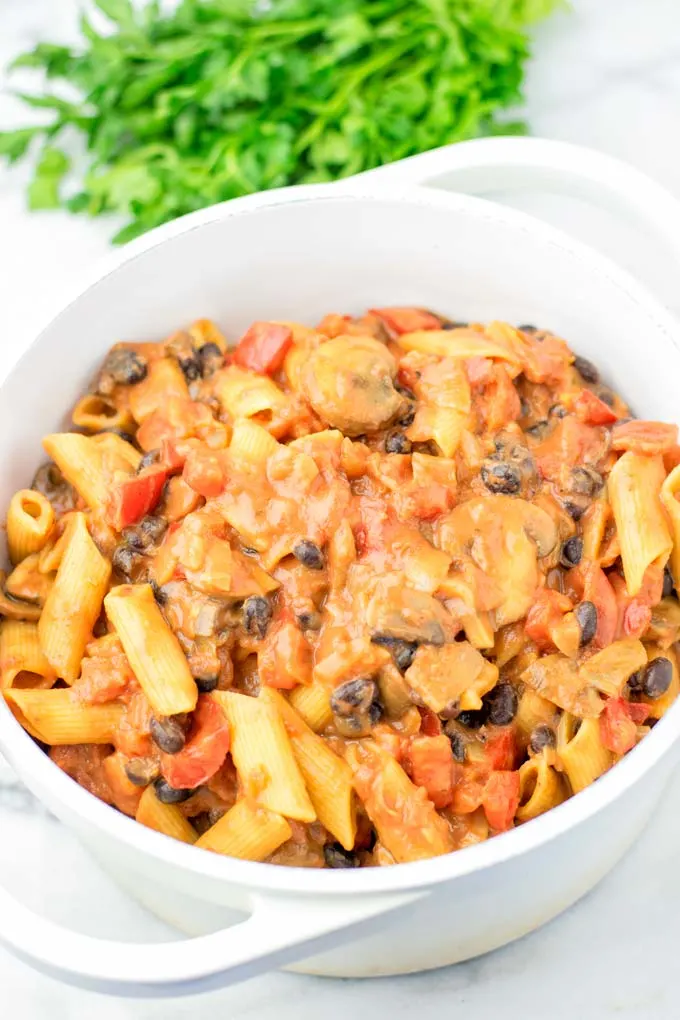 Closeup view of Cajun Pasta in a white pot.