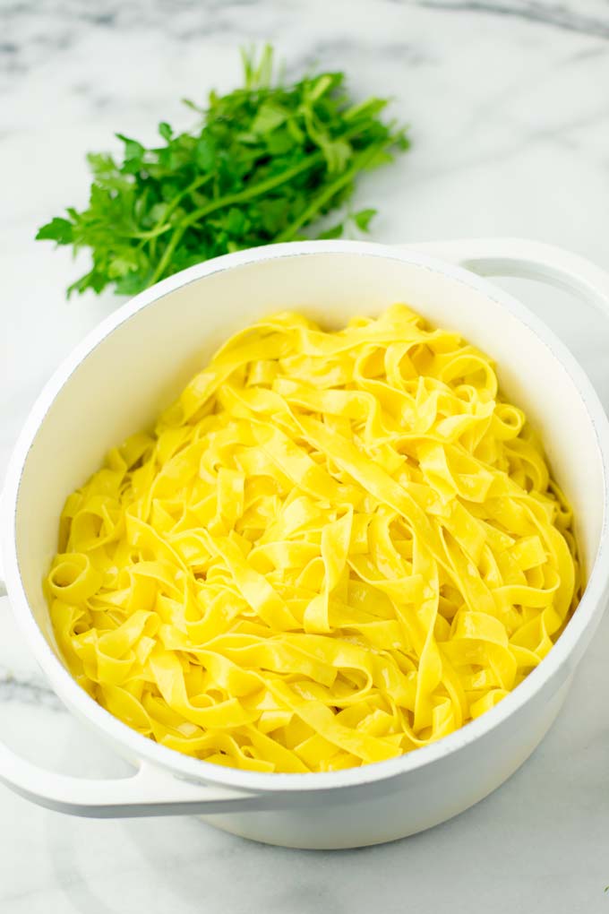 Large White Saucepan filled with pasta.