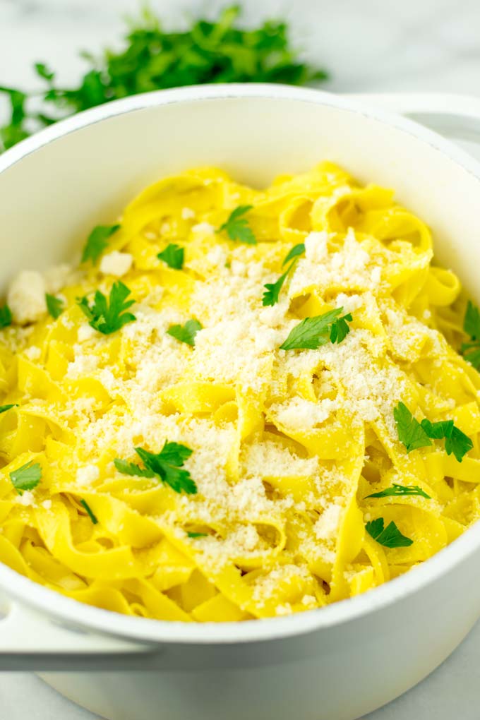 Closeup showing the melted garlic butter over pasta.