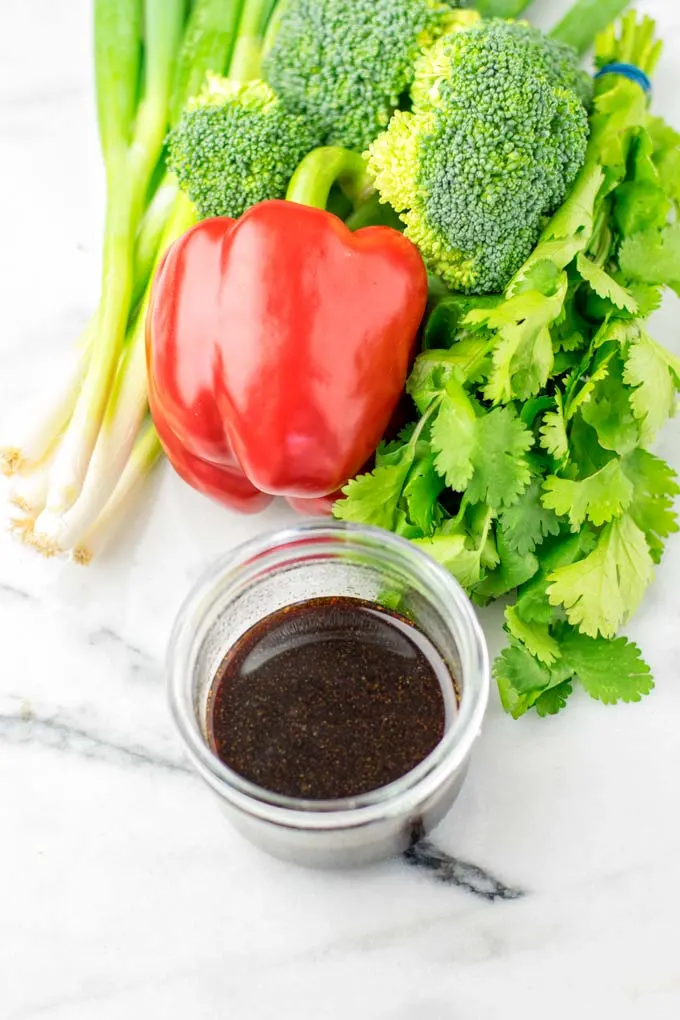 Bell pepper, spring onion and broccoli as stir fry vegetables.