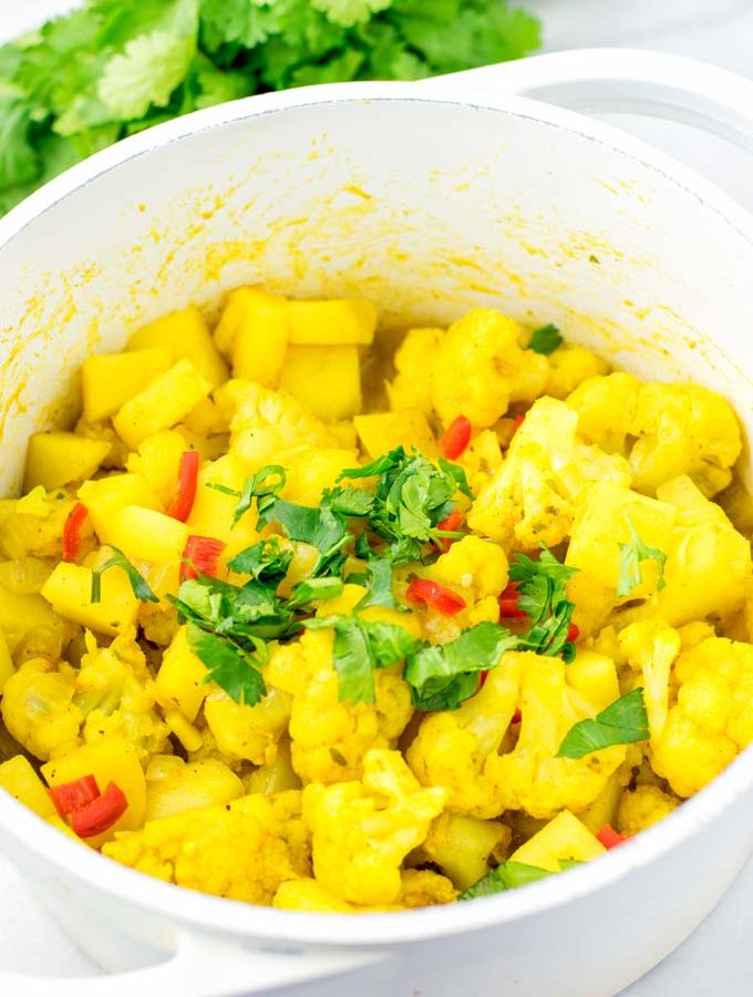 Family portion of Aloo Gobi is sprinkled with cilantro.