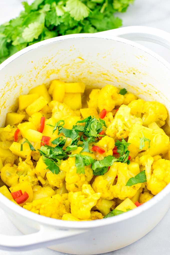 Family portion of Aloo Gobi is sprinkled with cilantro.