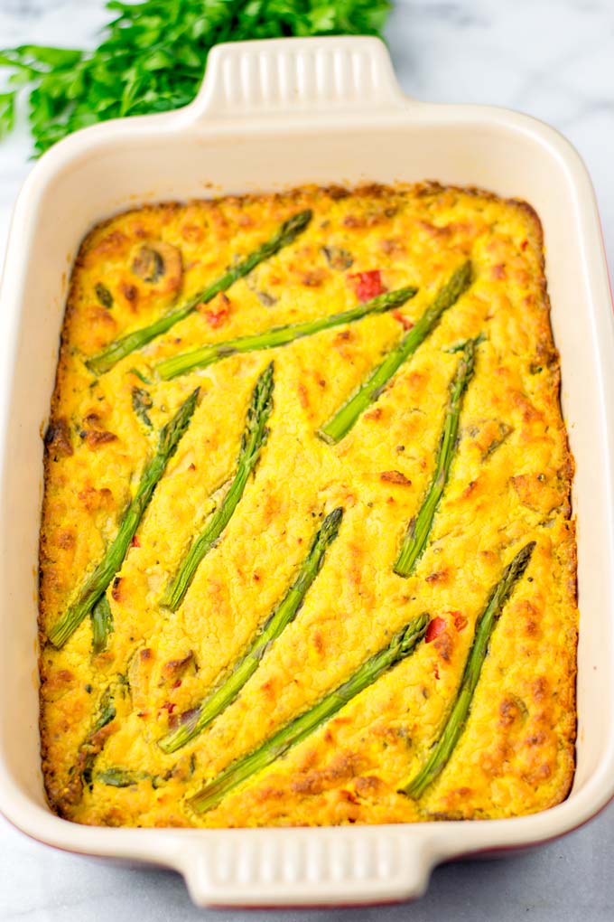 Full casserole dish with the quiche coming out of the oven.