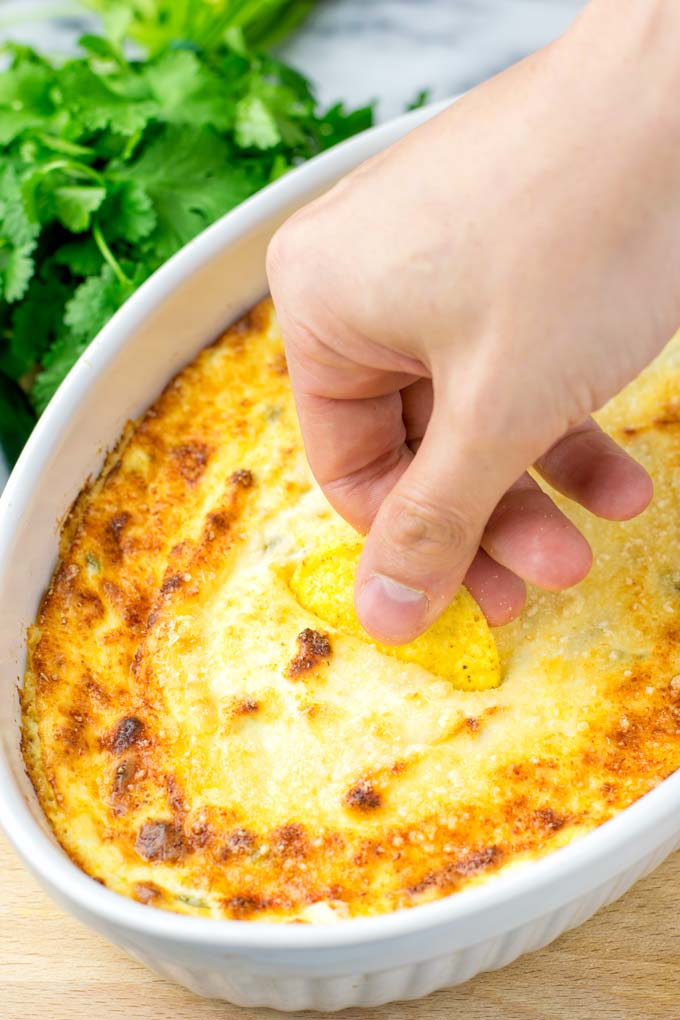 Enjoying the first taste of the Jalapeno Popper Dip with a nacho chip.