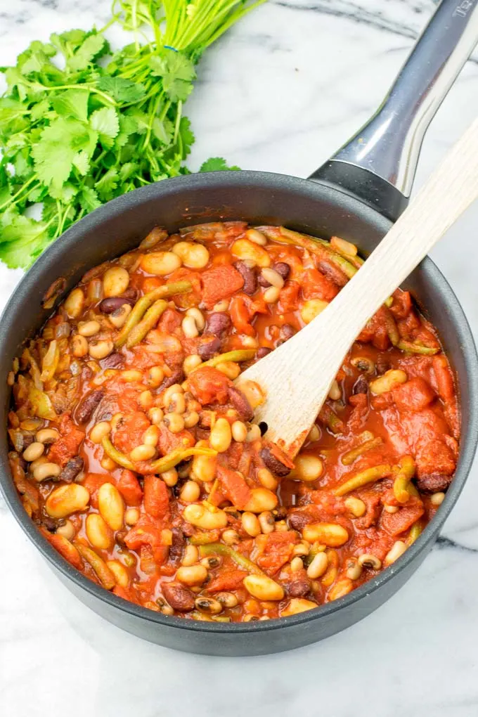 These homemade Ranch Style Beans are are made with four kinds of beans to create the perfect texture. Super easy to make in one pot, crockpot ready, and seriously so easy plus delicious! Naturally vegan, gluten free once you’ve tried it, you want coming back for in no time. A keeper that the whole family will love, even the pickiest kids. 