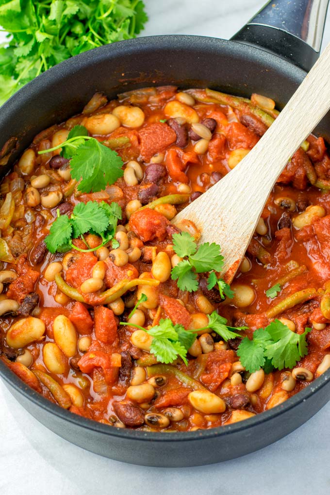 These homemade Ranch Style Beans are are made with four kinds of beans to create the perfect texture. Super easy to make in one pot, crockpot ready, and seriously so easy plus delicious! Naturally vegan, gluten free once you’ve tried it, you want coming back for in no time. A keeper that the whole family will love, even the pickiest kids. 