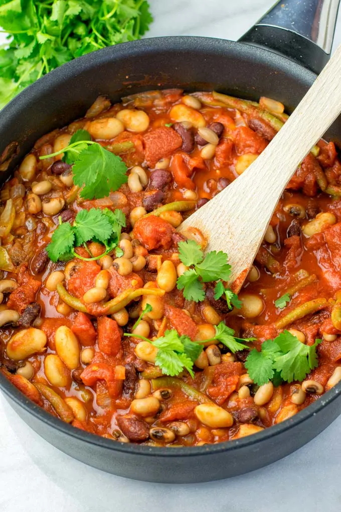 These homemade Ranch Style Beans are are made with four kinds of beans to create the perfect texture. Super easy to make in one pot, crockpot ready, and seriously so easy plus delicious! Naturally vegan, gluten free once you’ve tried it, you want coming back for in no time. A keeper that the whole family will love, even the pickiest kids. 