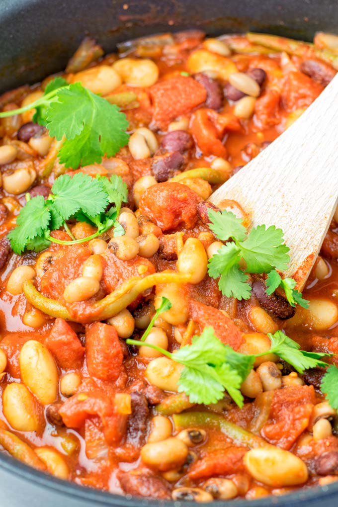 These homemade Ranch Style Beans are are made with four kinds of beans to create the perfect texture. Super easy to make in one pot, crockpot ready, and seriously so easy plus delicious! Naturally vegan, gluten free once you’ve tried it, you want coming back for in no time. A keeper that the whole family will love, even the pickiest kids. 