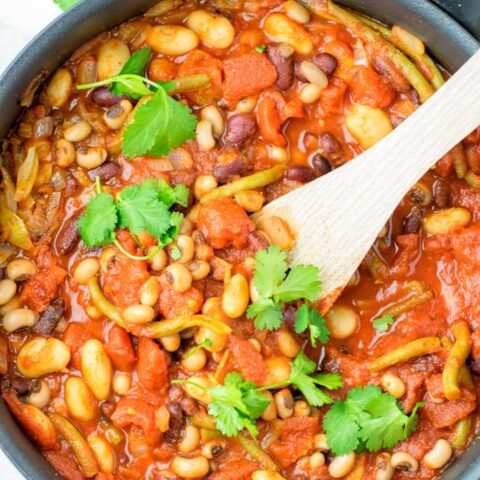 These homemade Ranch Style Beans are are made with four kinds of beans to create the perfect texture. Super easy to make in one pot, crockpot ready, and seriously so easy plus delicious! Naturally vegan, gluten free once you’ve tried it, you want coming back for in no time. A keeper that the whole family will love, even the pickiest kids.