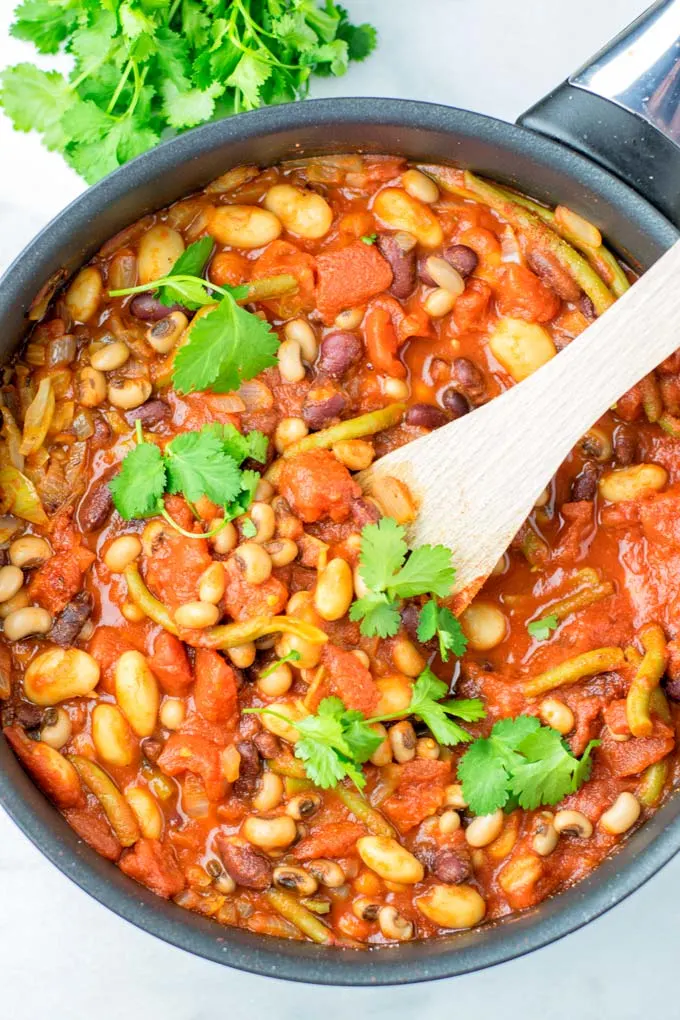 These homemade Ranch Style Beans are are made with four kinds of beans to create the perfect texture. Super easy to make in one pot, crockpot ready, and seriously so easy plus delicious! Naturally vegan, gluten free once you’ve tried it, you want coming back for in no time. A keeper that the whole family will love, even the pickiest kids. 