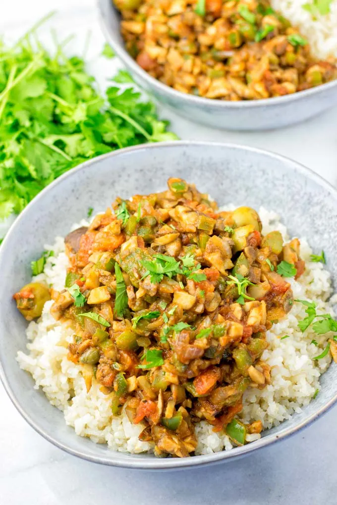 This vegan picadillo recipe needs mushrooms, onions, bell pepper, raisins, and capers.