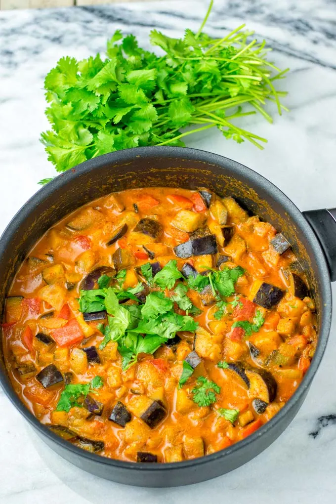 Cook eggplant, bell pepper, onions in one pot.