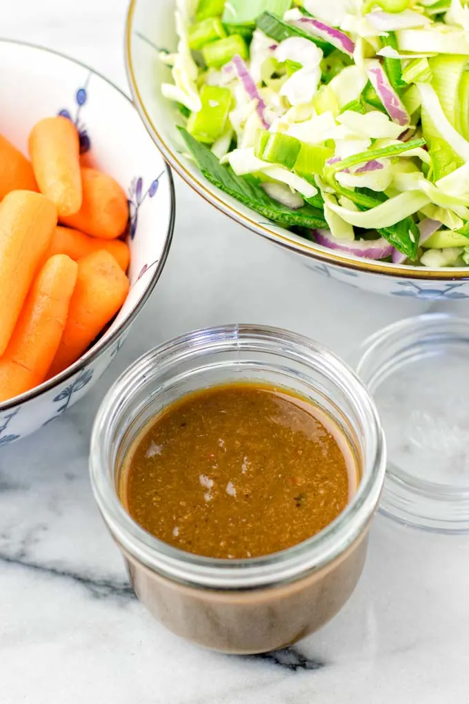 The Pad Thai Sauce is stored in a glass jar.