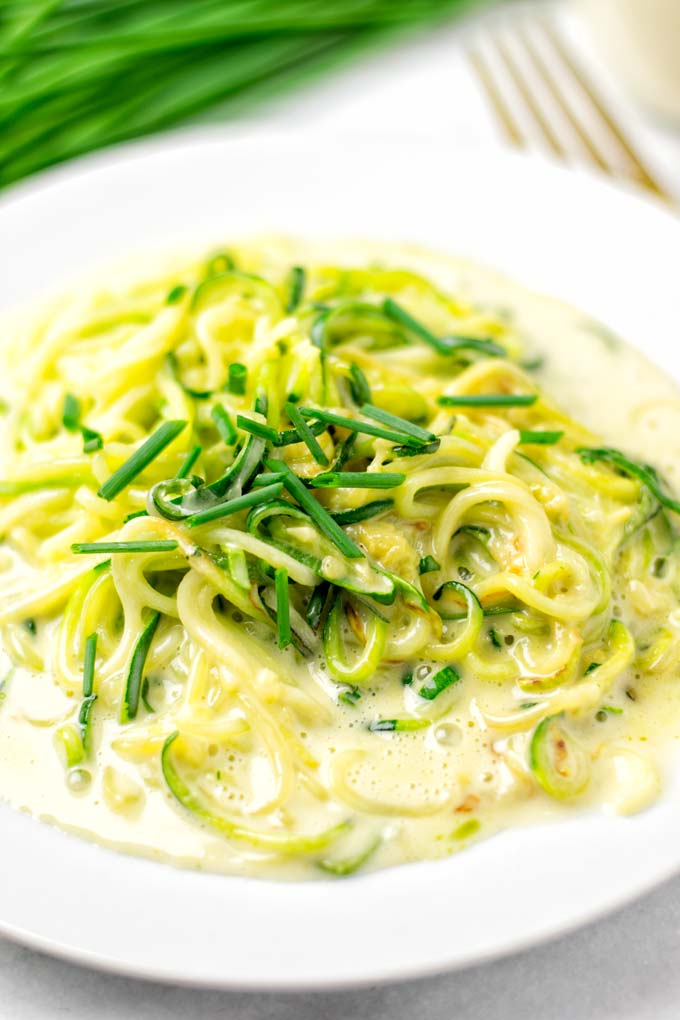 Fresh chives are used to decorate the dish.