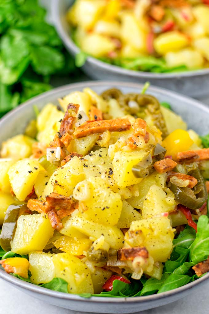 Closeup view of the hot potato salad, showing the smoked tofu stripes.