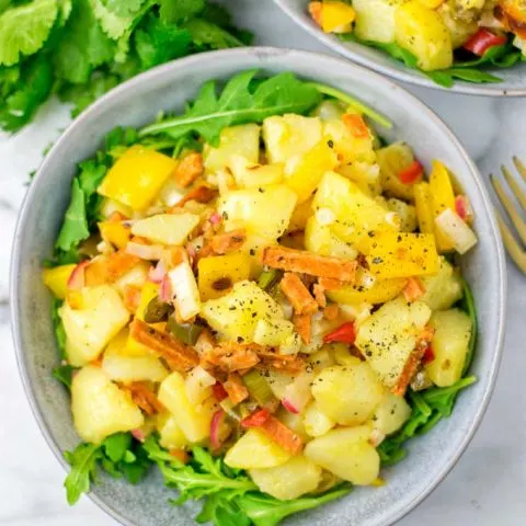 Top view of the salad, showing the potatoes and all tasty ingredients.