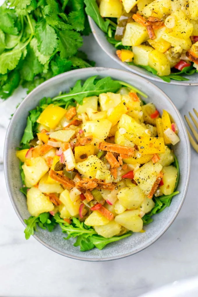 Top view of the salad, showing the potatoes and all tasty ingredients.