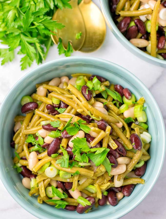 Fresh parsley is used to decorate this easy bean salad.