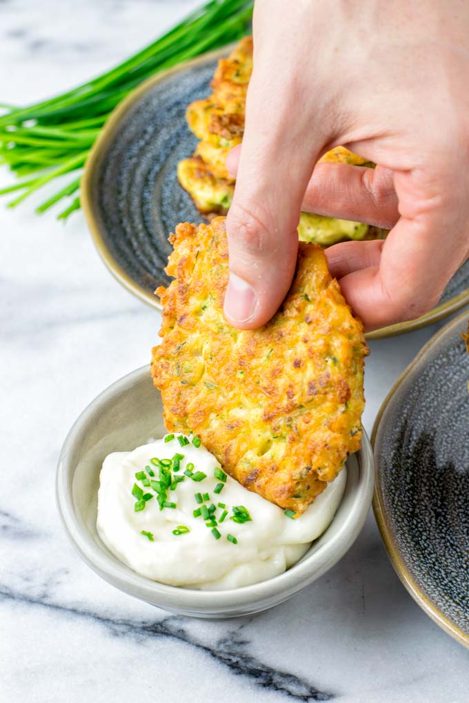 Zucchini Fritters athat you can take in your hands and dip into a sauce. They do not fall apart.