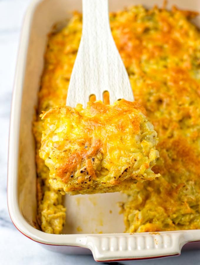 Portion of the Hashbrown Casserole is lifted up.