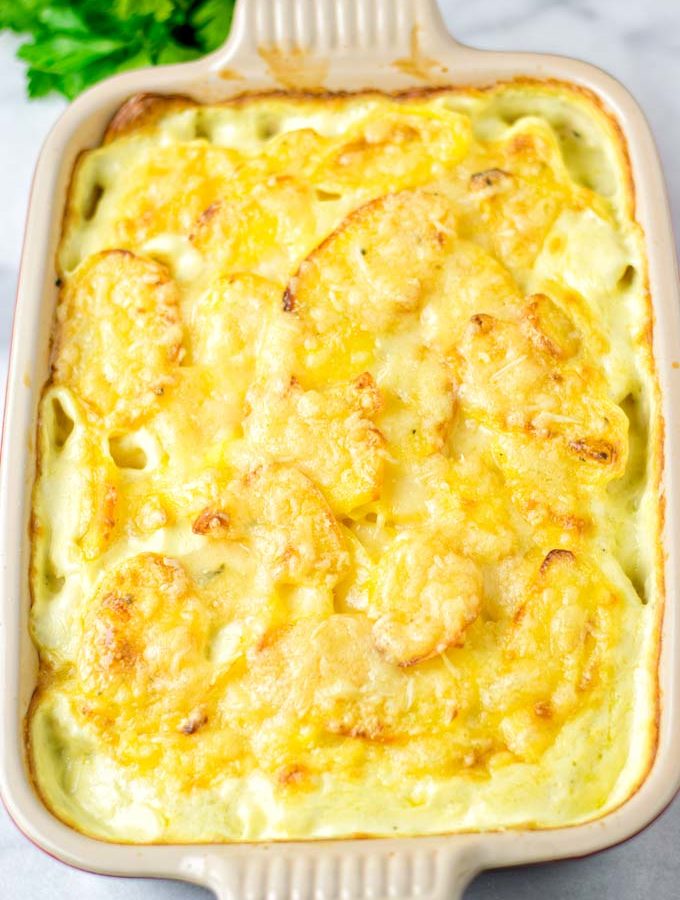 Full casserole dish with the potatoes au gratin.