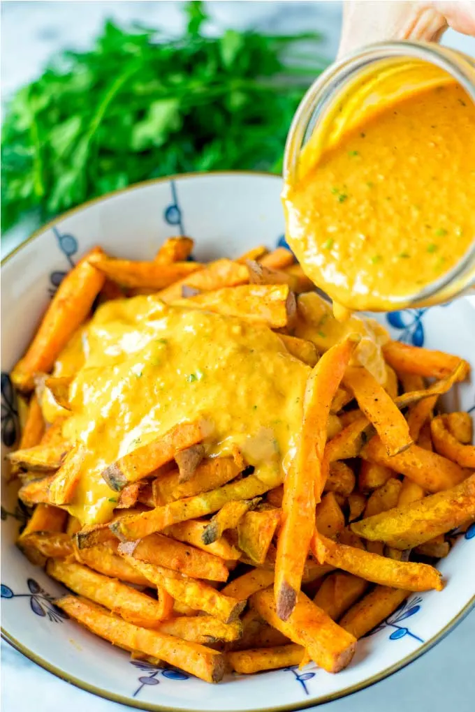 Awesome sauce is given over sweet potatoes.
