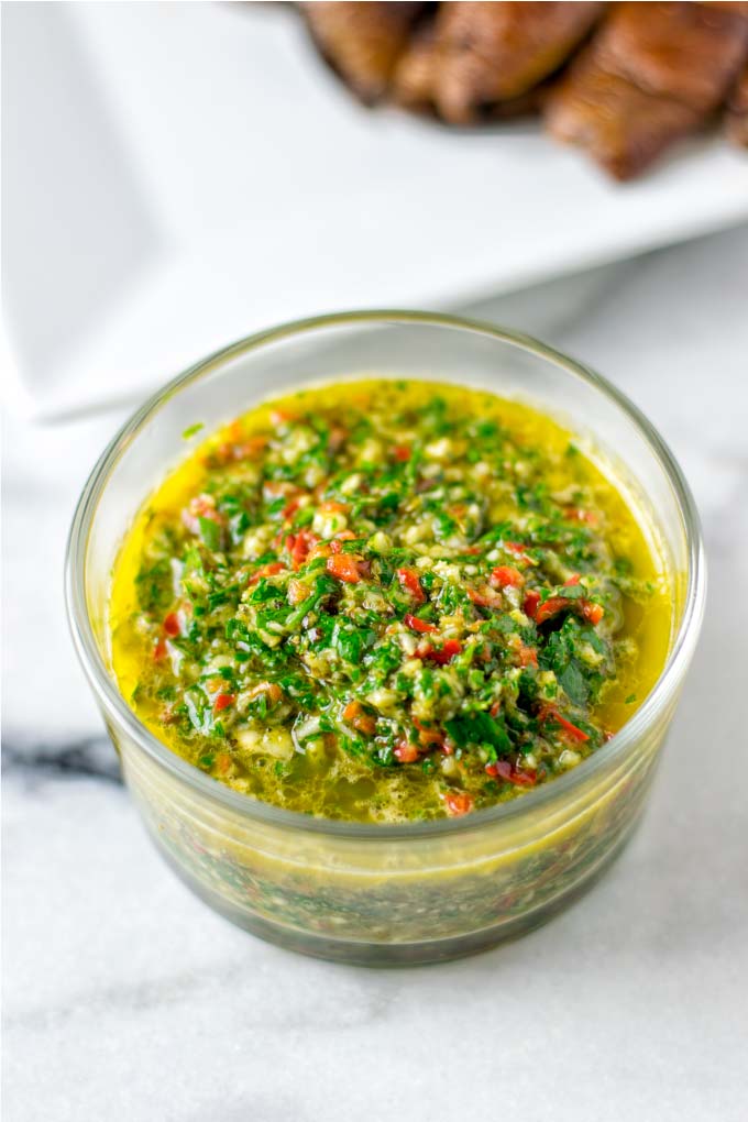 The ready Chimichurri Sauce in a glass jar.