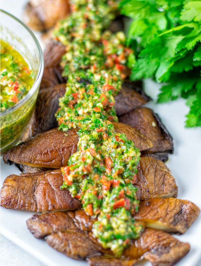 Chimichurri Sauce is given over Portobello mushrrom steak strips.