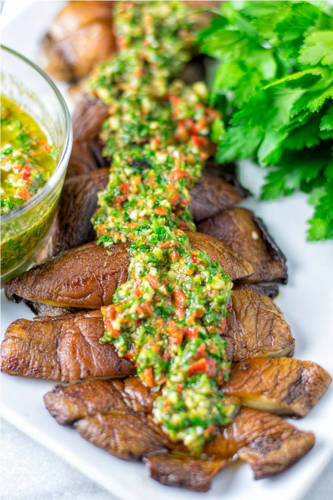 Chimichurri Sauce is given over Portobello mushrrom steak strips.