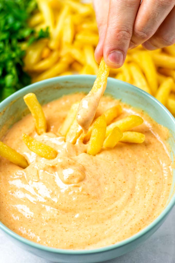 Enjoying this finger-licking good Fry Sauce.